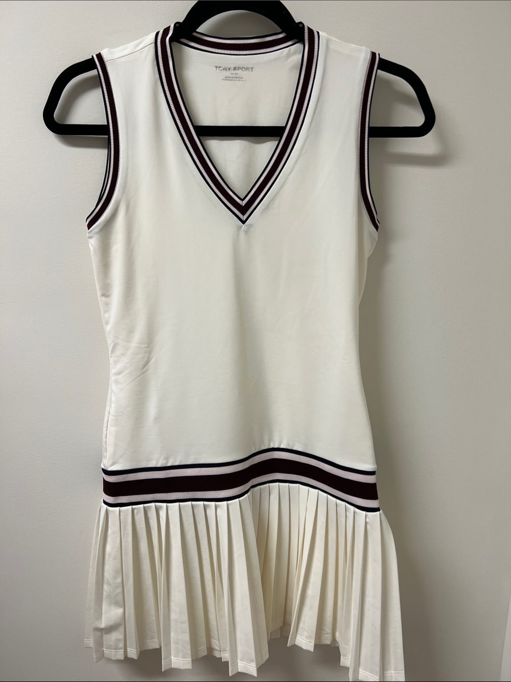 Tory Sport Cream Sleeveless Pleated Tennis Dress with Black and Burgundy Trim